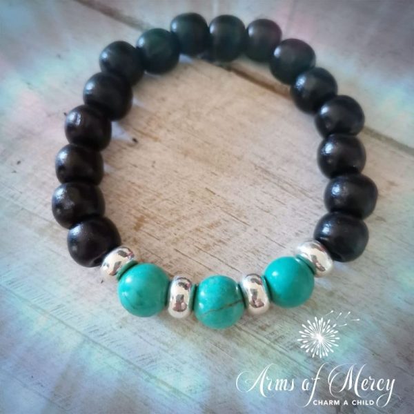 Black Wood and Turquoise Gemstone Bracelet © Arms of Mercy NPC